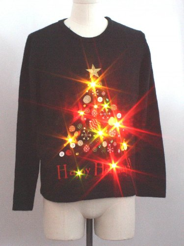 Illustration for article titled 8 Awesome* Teched-Out Christmas Sweaters